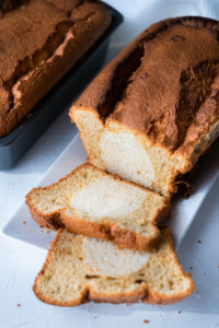 Two loaves of coffee bread cake made with fluffy bread and moist coffee sponge cake.