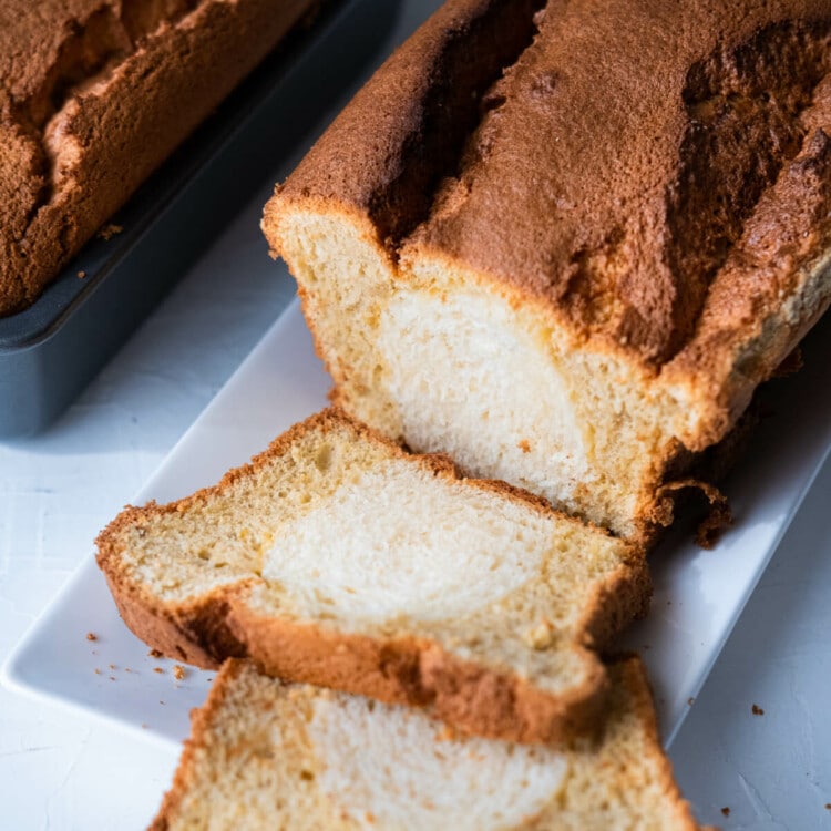 Two loaves of coffee bread cake made with fluffy bread and moist coffee sponge cake.