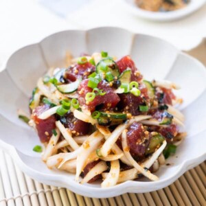 Poke bowl with onion and cucumber.