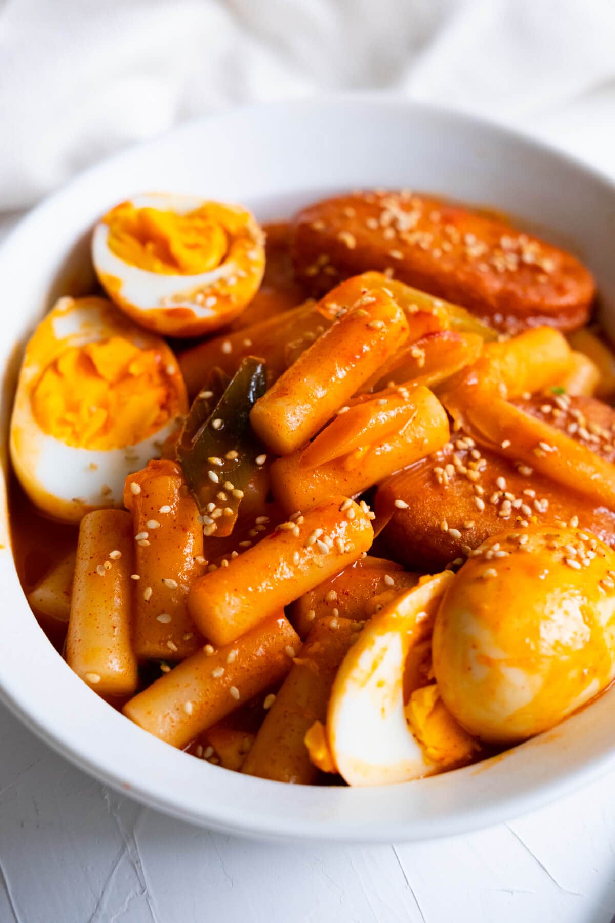 Homemade spicy Korean rice cake, tteobokki cooked in a hot red sauce. 