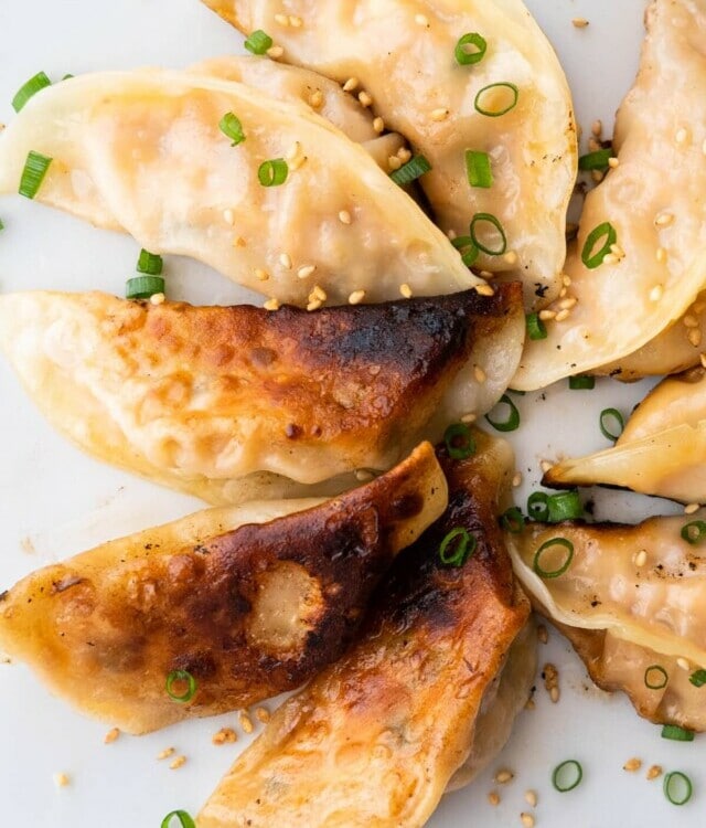 Pan-fried mandu with crispy bottom.