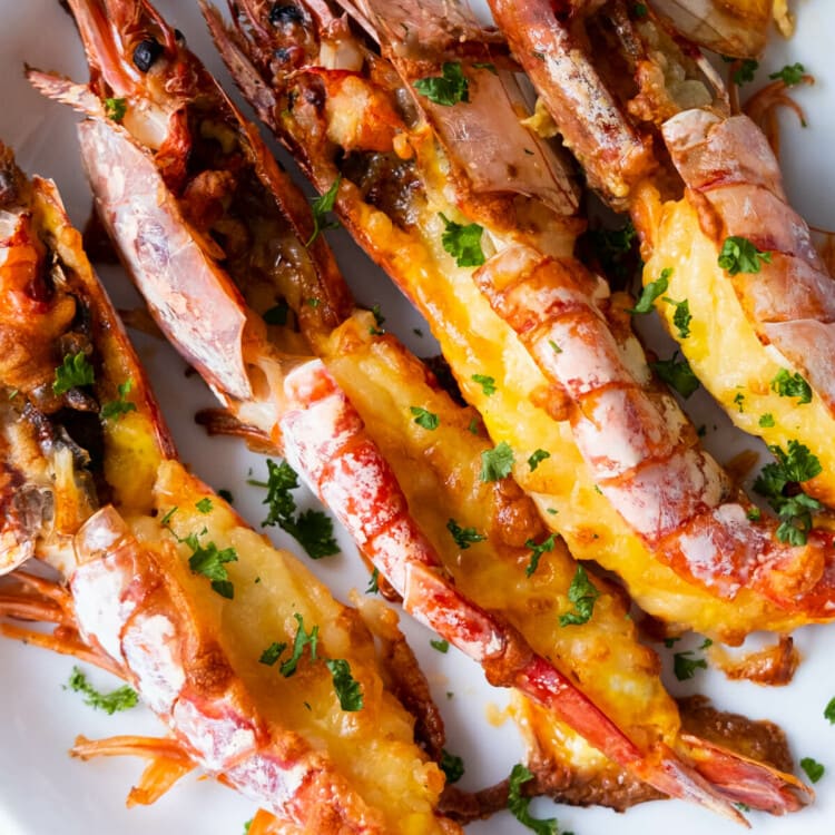 Grilled cheese prawns are perfectly baked with melted cheese.