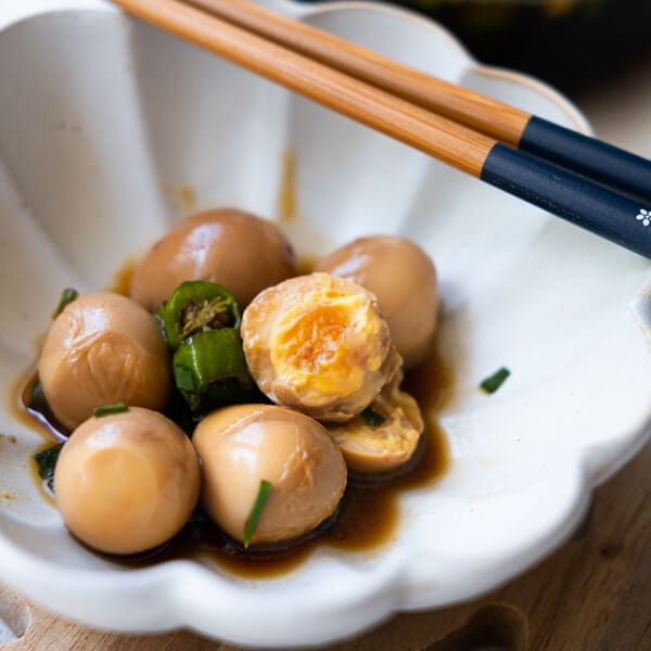Easy, delicious soy sauce quail eggs with soft egg yolk in the center.