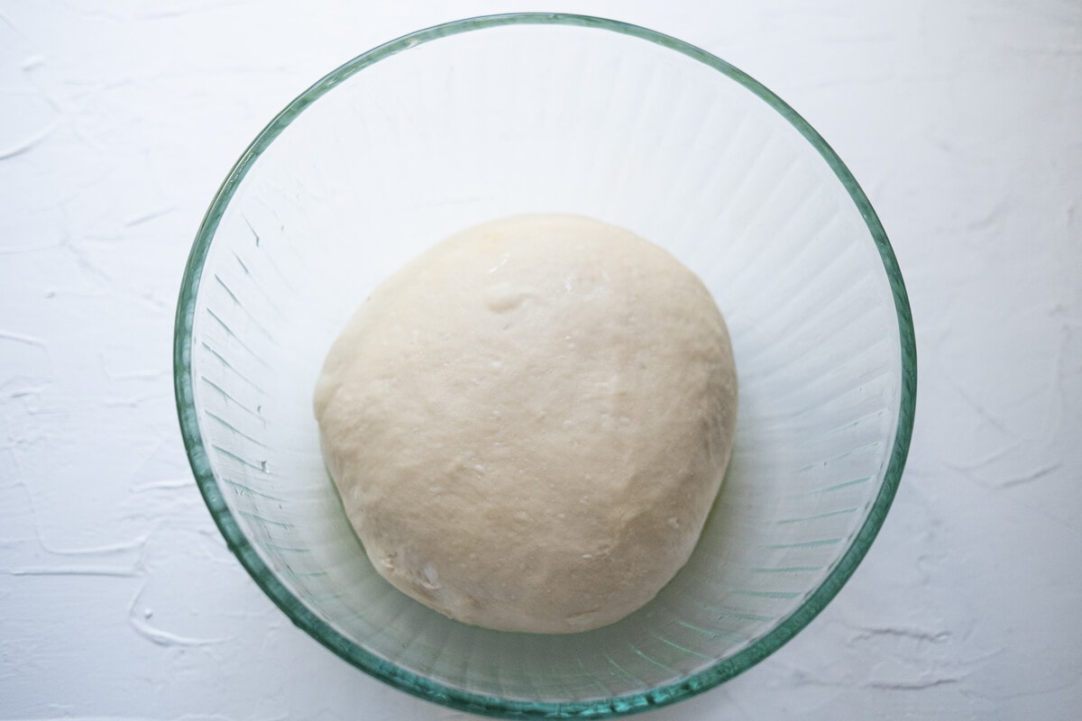 A dough in a bowl. 