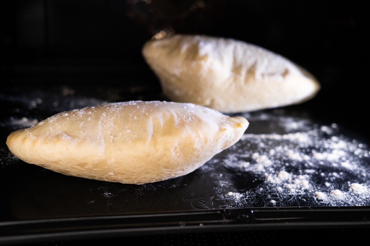 Bake the pita bread until puffy and slightly browned. 