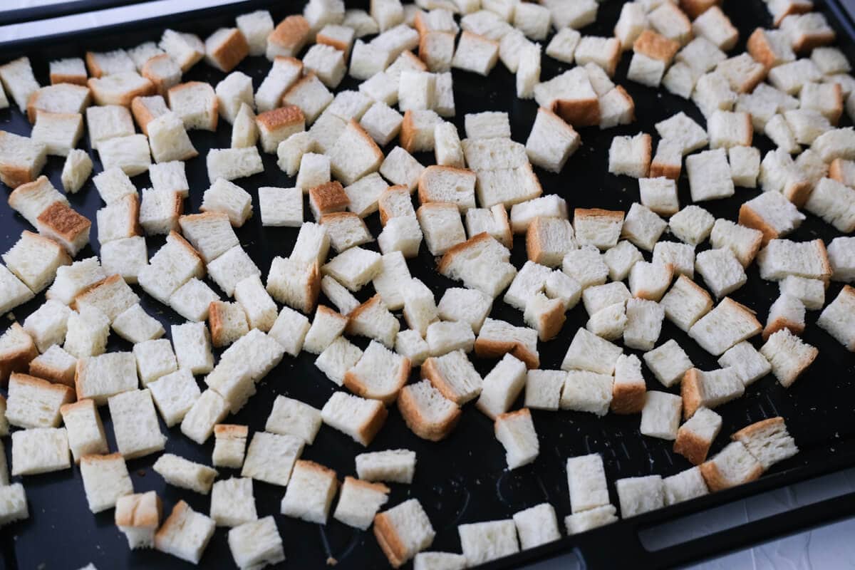 Dry out the white bread cubed in the oven. 