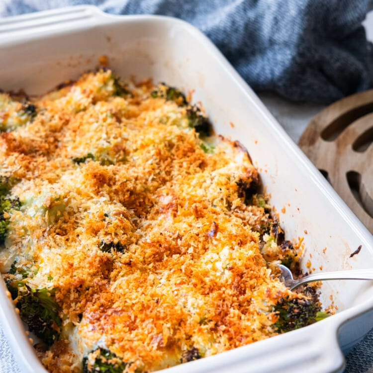 Easy broccoli gratin baked in a baking dish and topped with bread crumbs.