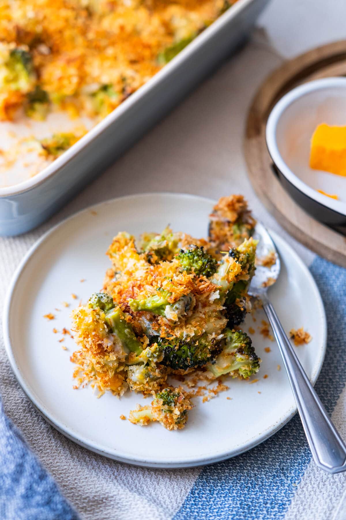 Rich and crispy broccoli gratin served in a plate. 