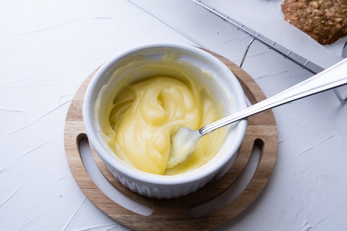 Fluffy yellow melted butter in a saucepan. 