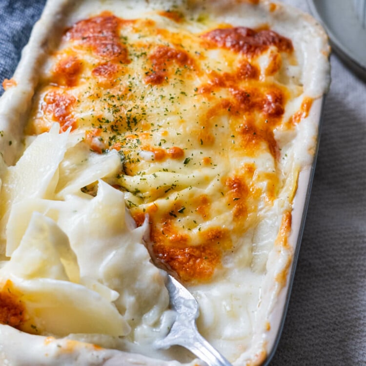 Easy potato gratin is perfectly baked with melting cheese on top.