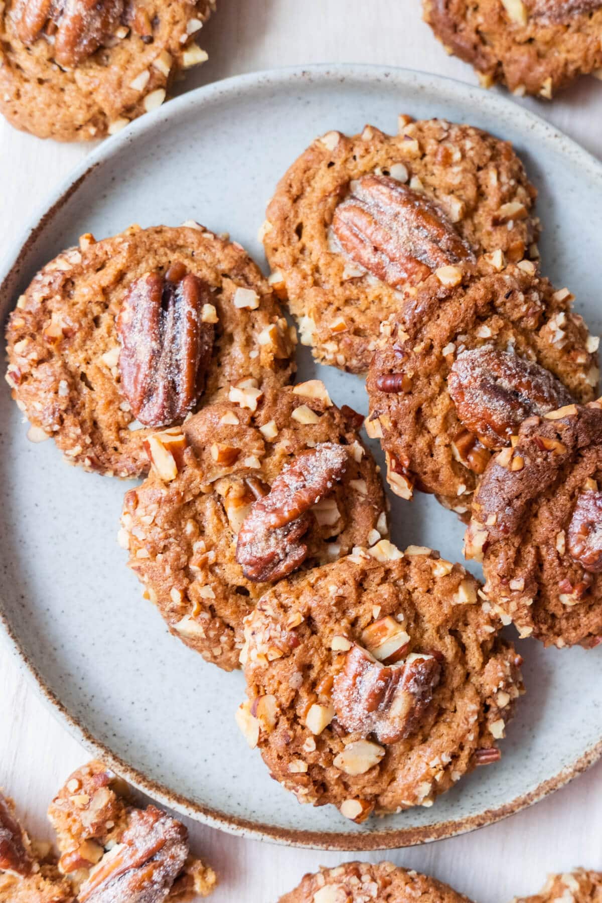 Butter pecan cookies loaded with chopped pecans and topped with pecan halves.