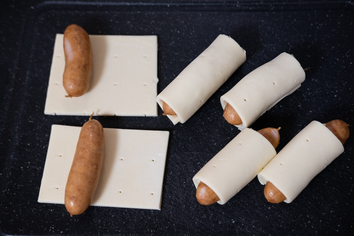 Mini hot dogs wrapped in pastry. 
