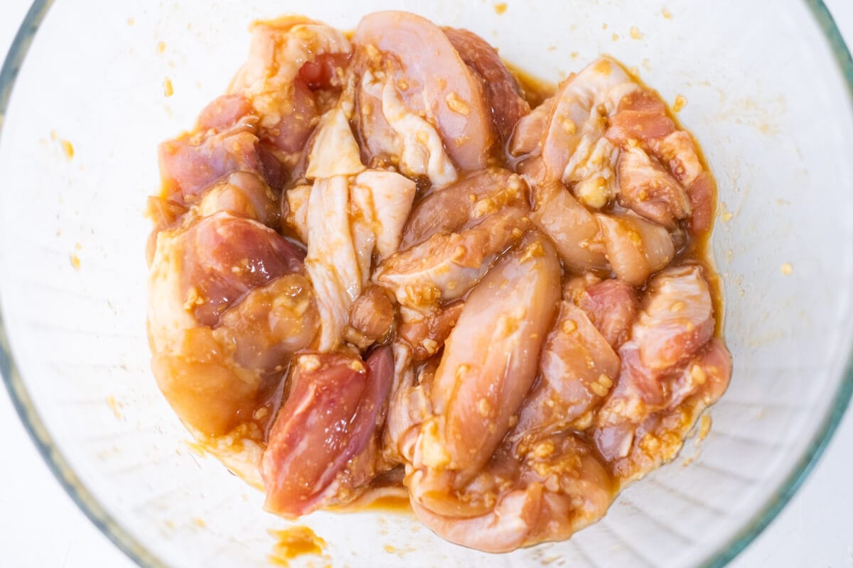 Marinate chicken thigh slices in a mixture of miso paste, honey and soy sauce. 
