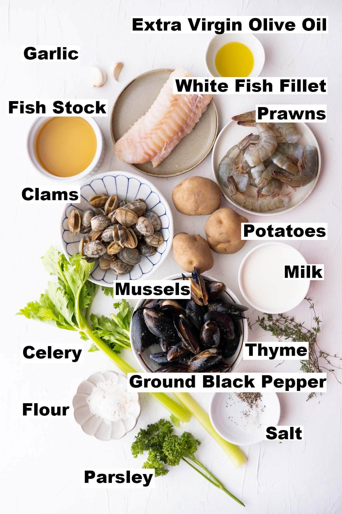 A picture shows the ingredients for seafood chowder recipe. 