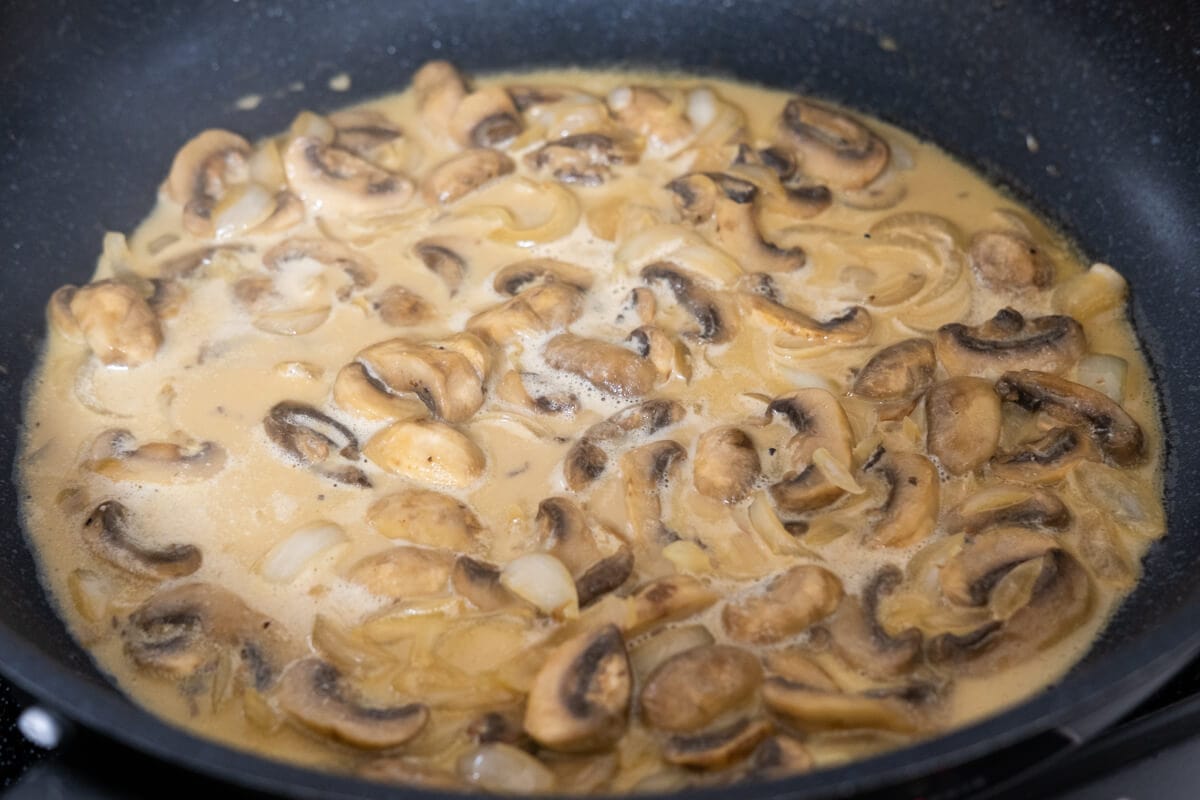 Cook the sautéd mushrooms in a cream-based sauce. 