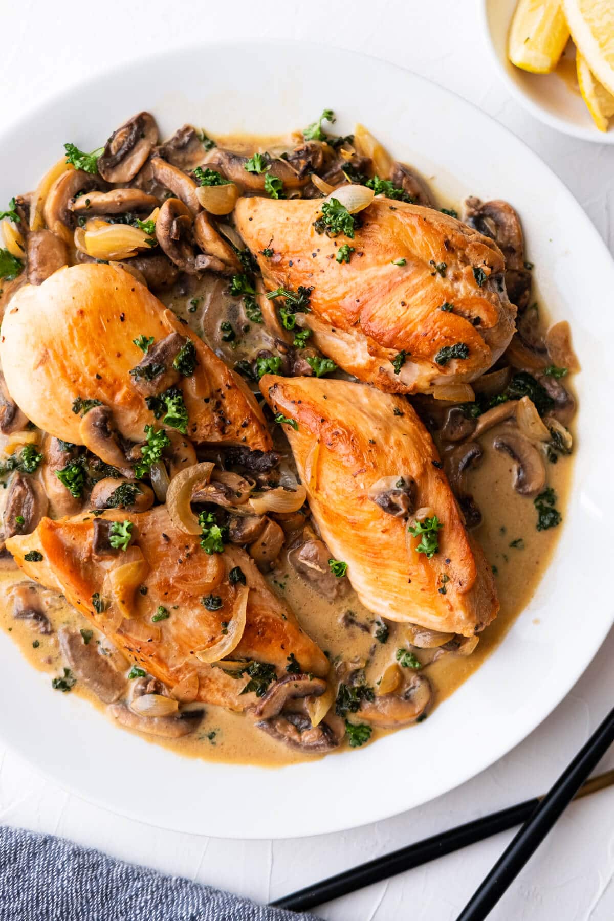 Chicken diane yields seared chicken breasts in a creamy Diane sauce and garnish with freshly chopped parsley.