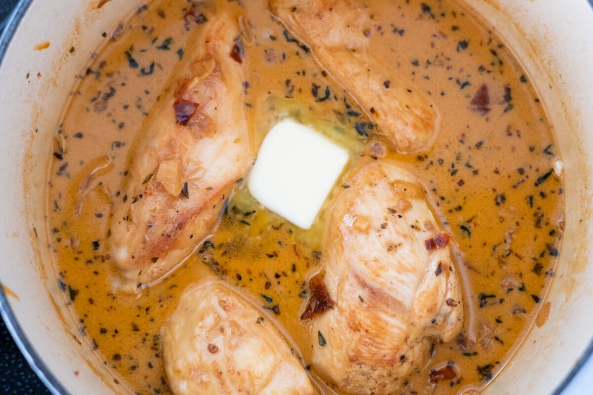 Cook the chicken breast slices with the red sauce, and add unsalted butter . 