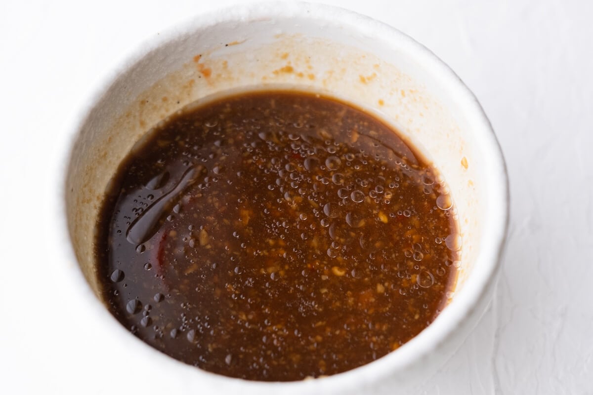 A bowl marinade sauce. combined with all the ingredients. 