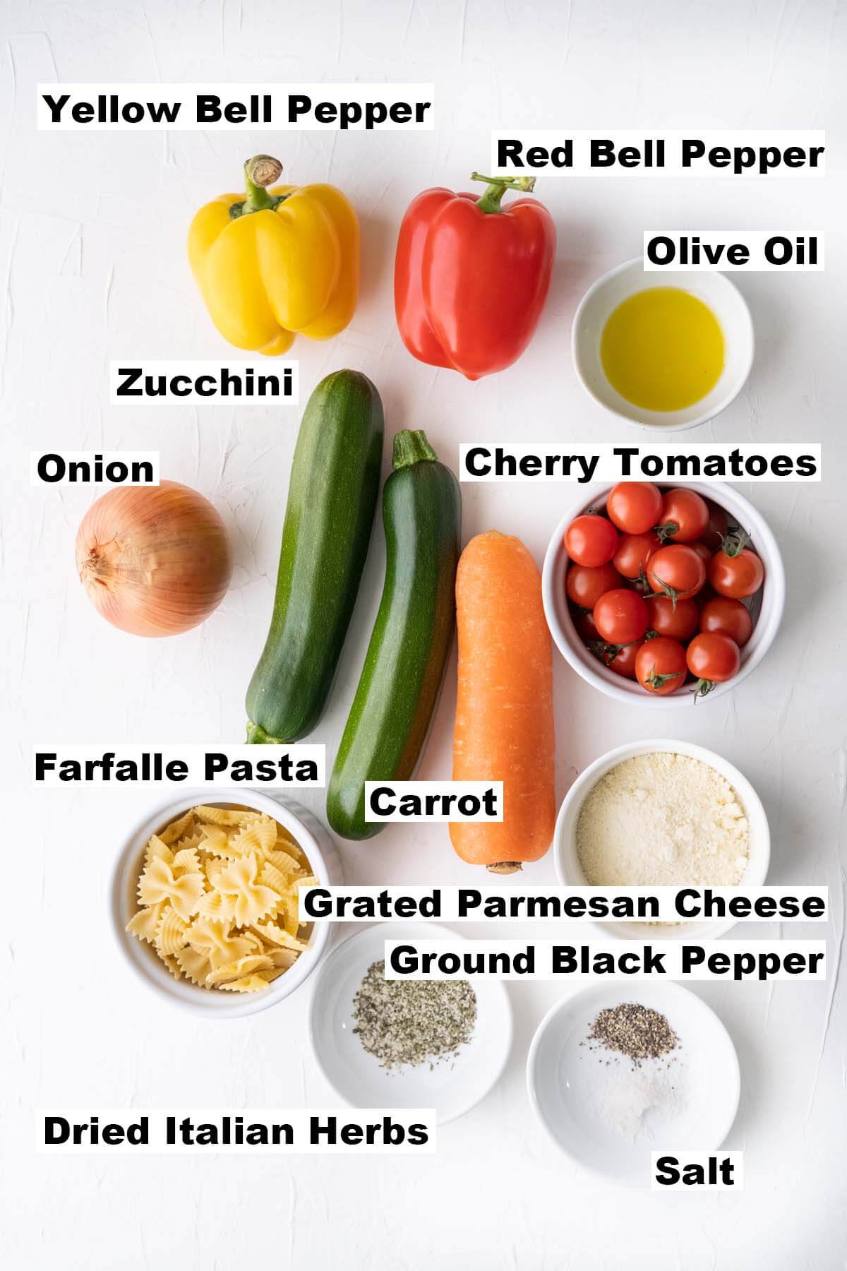 The picture shows all the ingredients for pasta primavera recipe. 