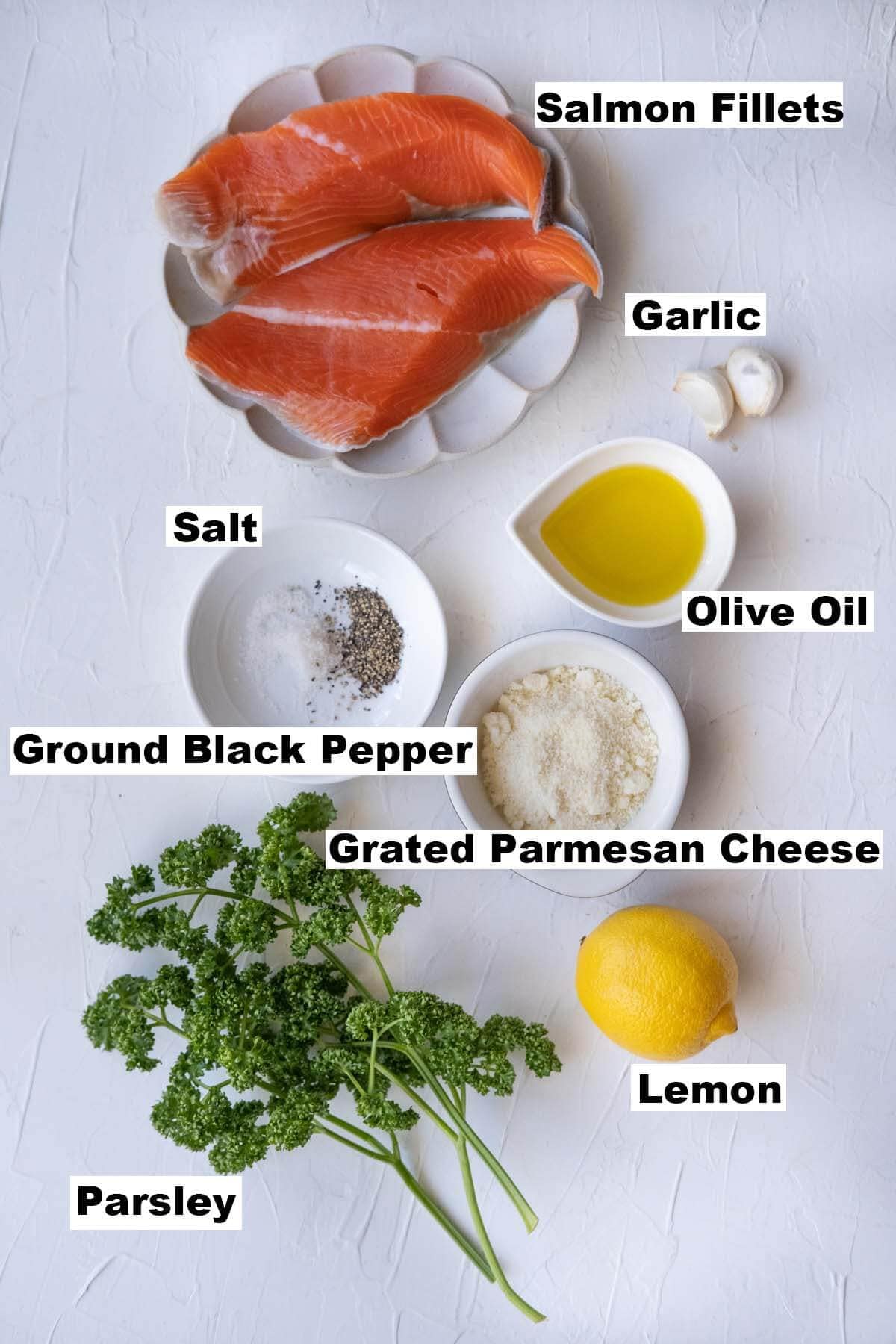 A picture shows all ingredients for garlic parmesan salmon recipe. 