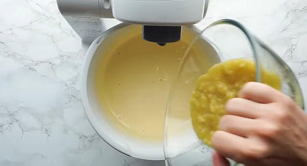 This image shows the Mashed Bananas being mixed into the Banana Cake Mixture.