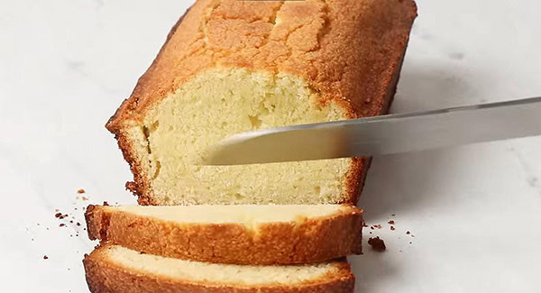 Cutting the Butter Cake into slices.