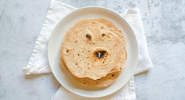 This image shows the Chapati being served on a plate.