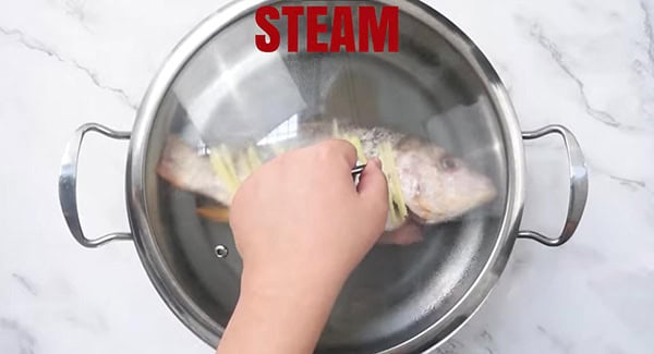 This image shows the fish in the steamer.