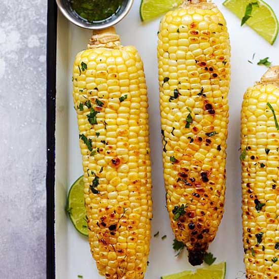 Best BBQ honey butter cilantro lime grilled corn. 