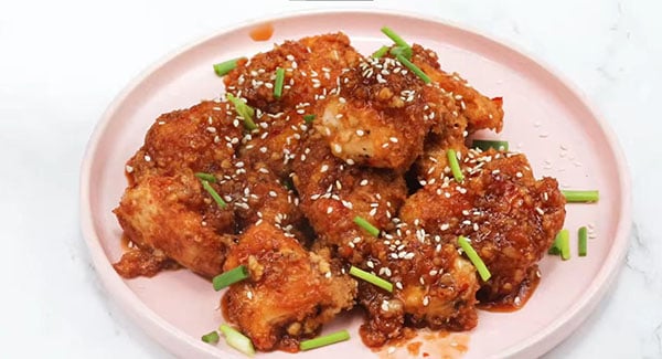 This image shows the Honey Garlic Chicken Bites being served on a plate.