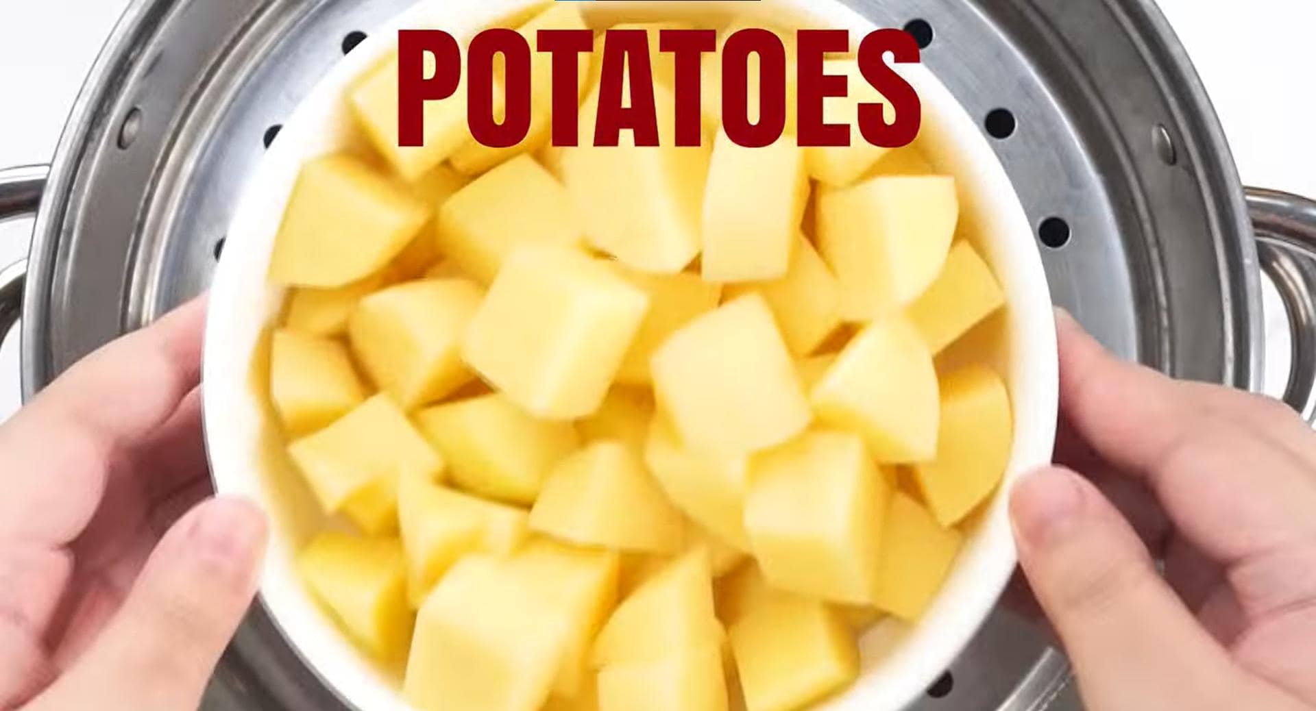 Bite-sized pieces of potatoes in a bowl. 