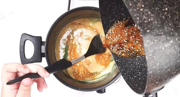 This image shows the caramel being added into the mixture.