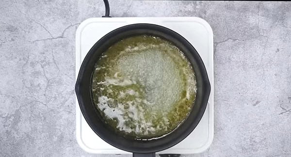 Cooking melted butter with white wine and lemon juice.