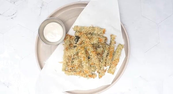 This image shows the Parmesan Zucchini Fries ready to be served.