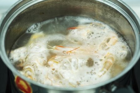 Making shrimp stock for Tom Yum Soup in a pot. 