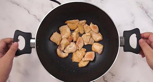 Chicken breast in a wok. 