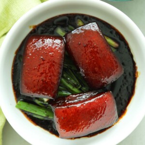 Easy homemade Chinese braised pork belly in brown thick gravy served in a bowl.