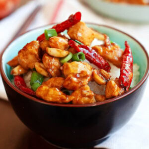 Kung pao chicken served in a Chinese bowl.