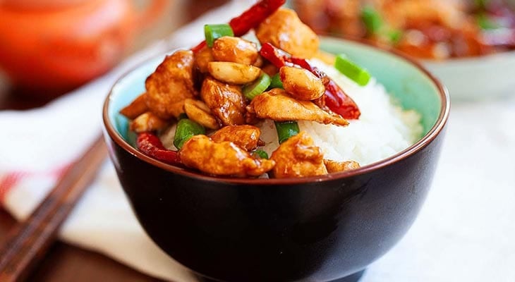 Kung Pao chicken served with fluffy white rice.