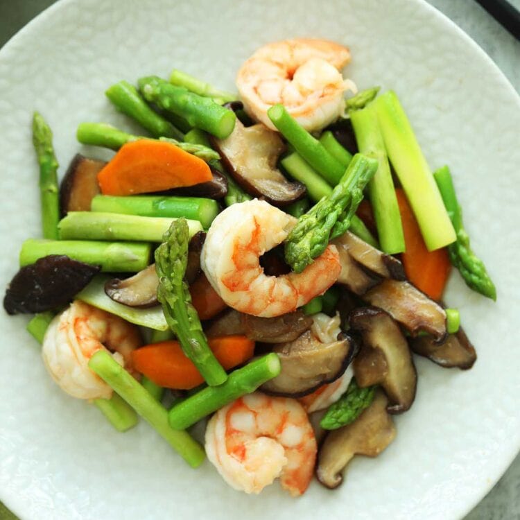 Easy and healthy Chinese asparagus dish with brown sauce.