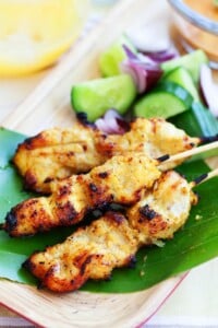 Thai chicken satay with peanut sauce, with cucumber salad.