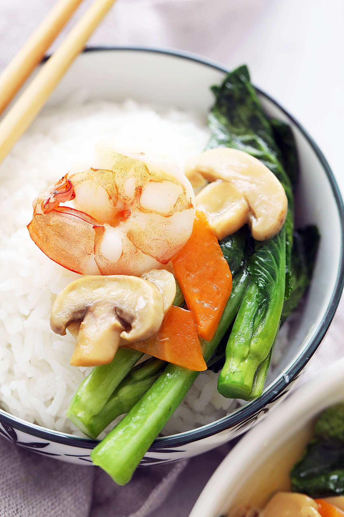 Choy sum stir fry with shrimp in a bowl. 