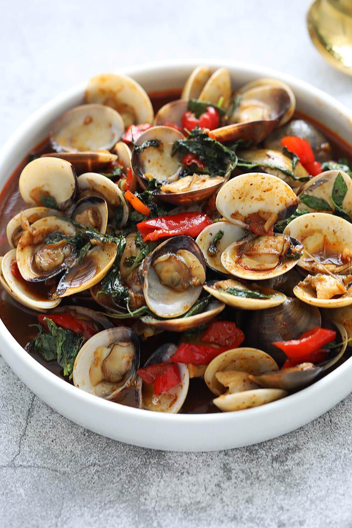 Thai style clams with basil, roasted chili paste and red chilies. 