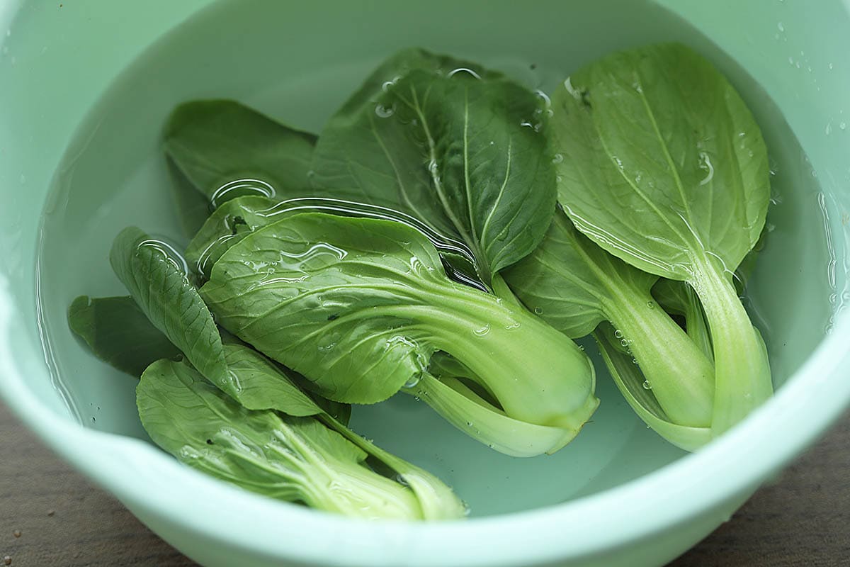 Fresh bok choy in a bowl.