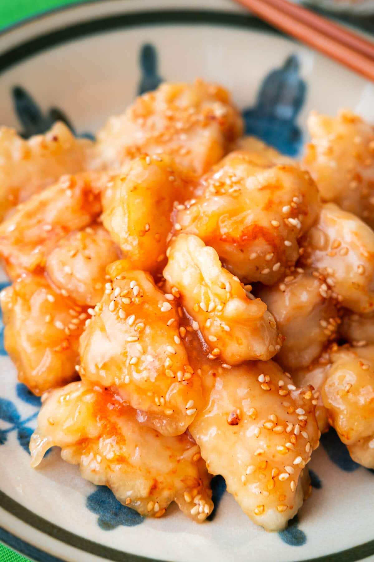 Crispy Asian honey chicken recipe, coated in a delicious honey sauce.