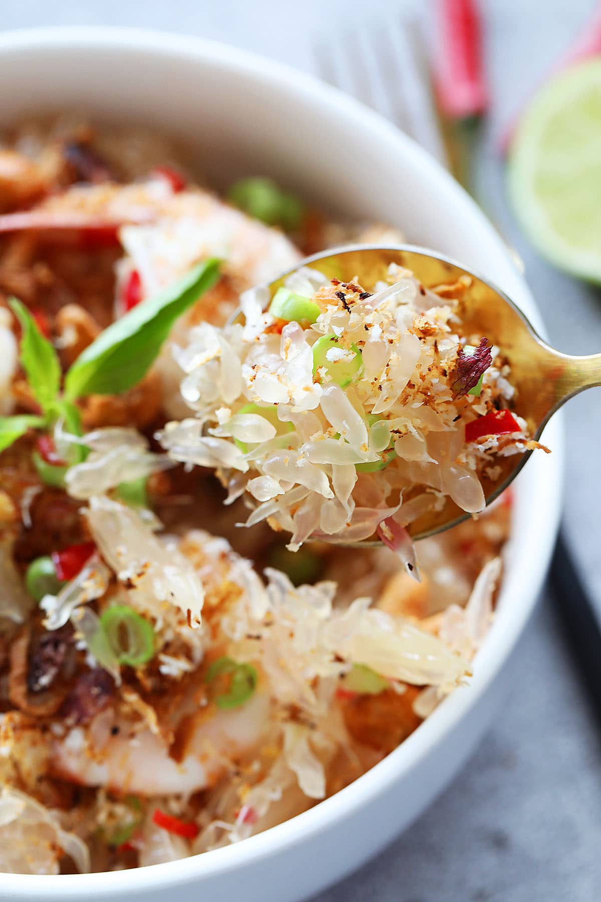 Pomelo salad on a spoon. 