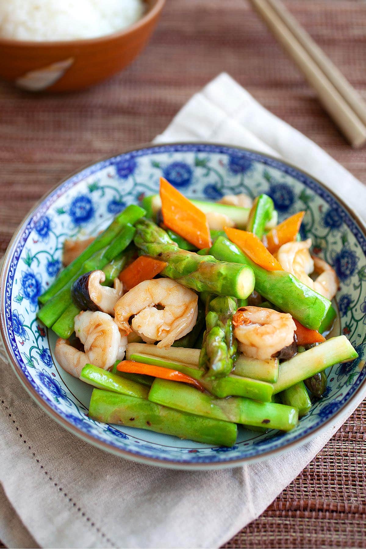 Delicious stir-fried asparagus with shrimp served on a plate.