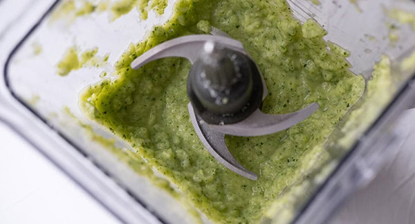 Blend the zucchini, skin, sourdough, grated parmesan, parsley and lemon juice in a food processor. 