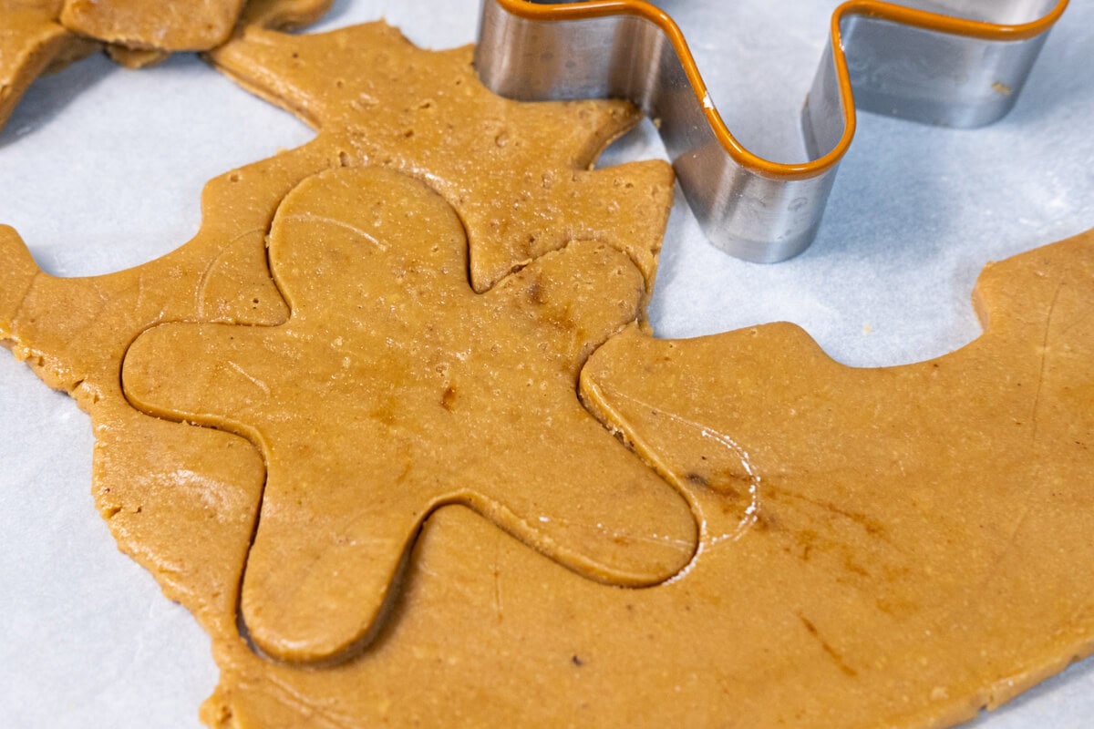 Using a rolling pin, roll dough 1/8 inch (⅓ oz) thick, and with a lightly floured cookie cutter, cut out shapes. 