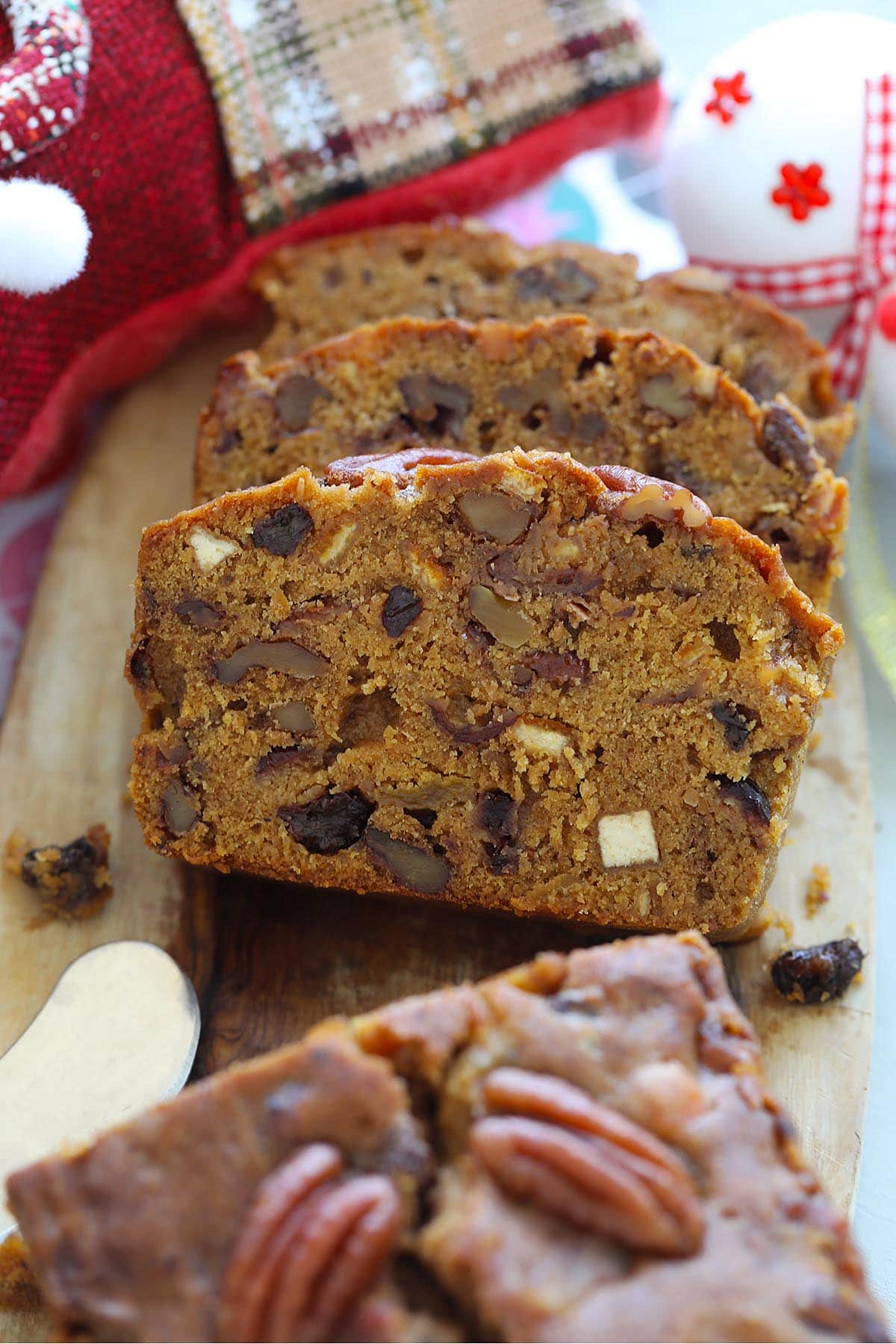 Christmas fruitcake recipe with brandy cut into slices.